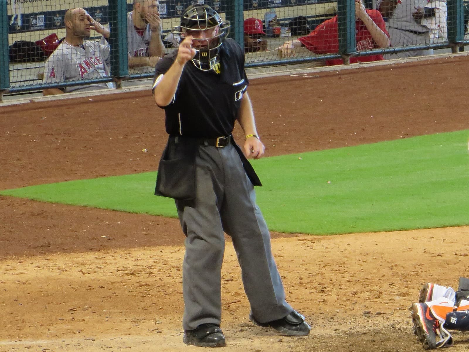 Umpire Lance Barksdale signals a strike on June 29, 2013 — the human call ABS challenges can now reverse in about 15 seconds when a batter, pitcher, or catcher taps for a review.